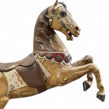 GUSTAVE BAYOL (1859 - 1931) Prancing merry-go-round horse in polychromed and gilded wood, with sulfide eyes.