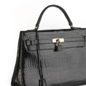 HERMÈS, Kelly saddle bag 32 cm in black porosus crocodile