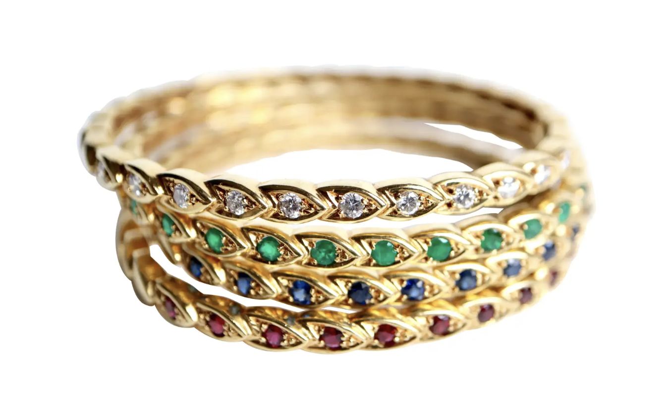 Chaumet, bracelets in stones, diamonds and yellow gold