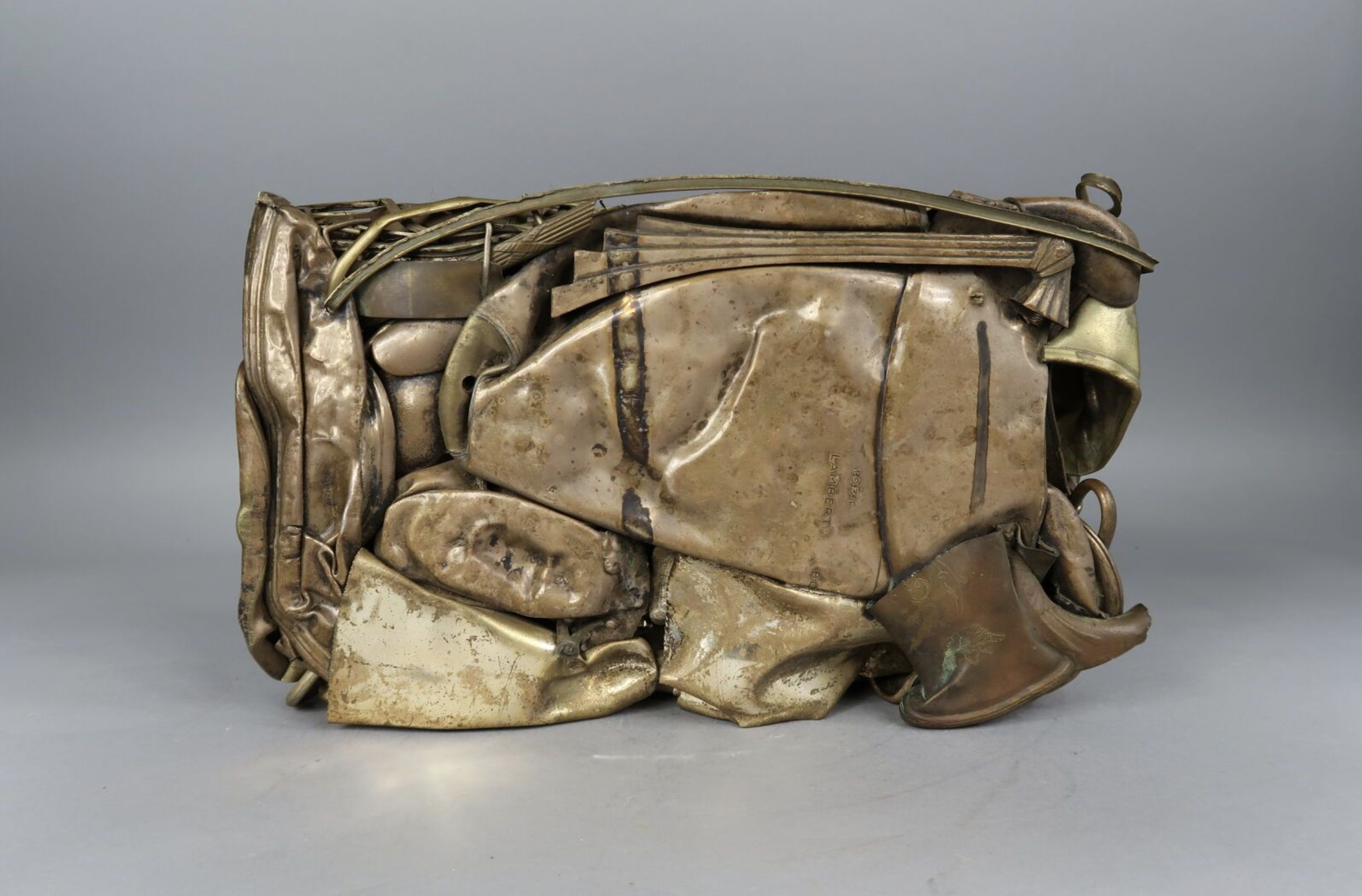 César, compression en bronze