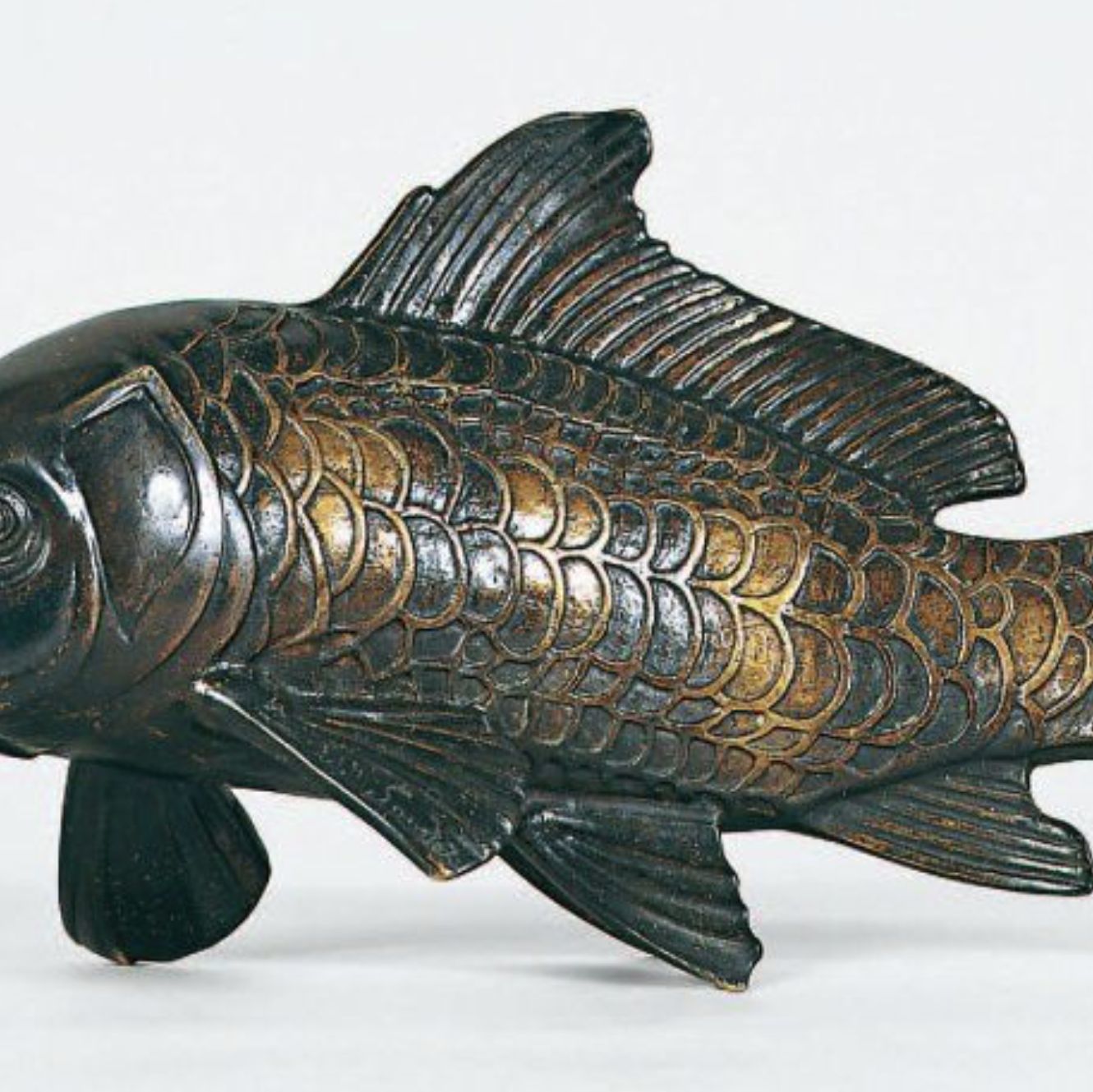 Fish in patinated bronze, signed Sandoz