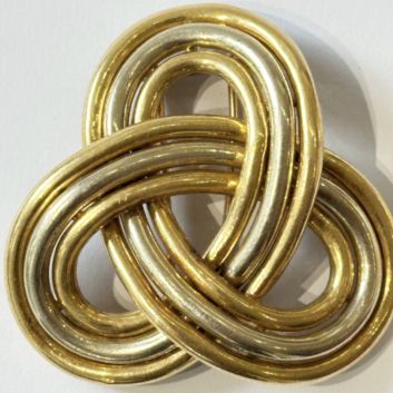 CARTIER PARIS, Trinity, 2-tone 18k gold clip brooch (750th)