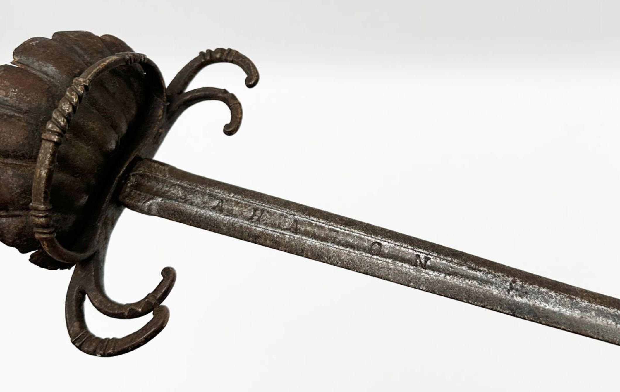 Example of an engraving on a "crab" town sword, 17th century