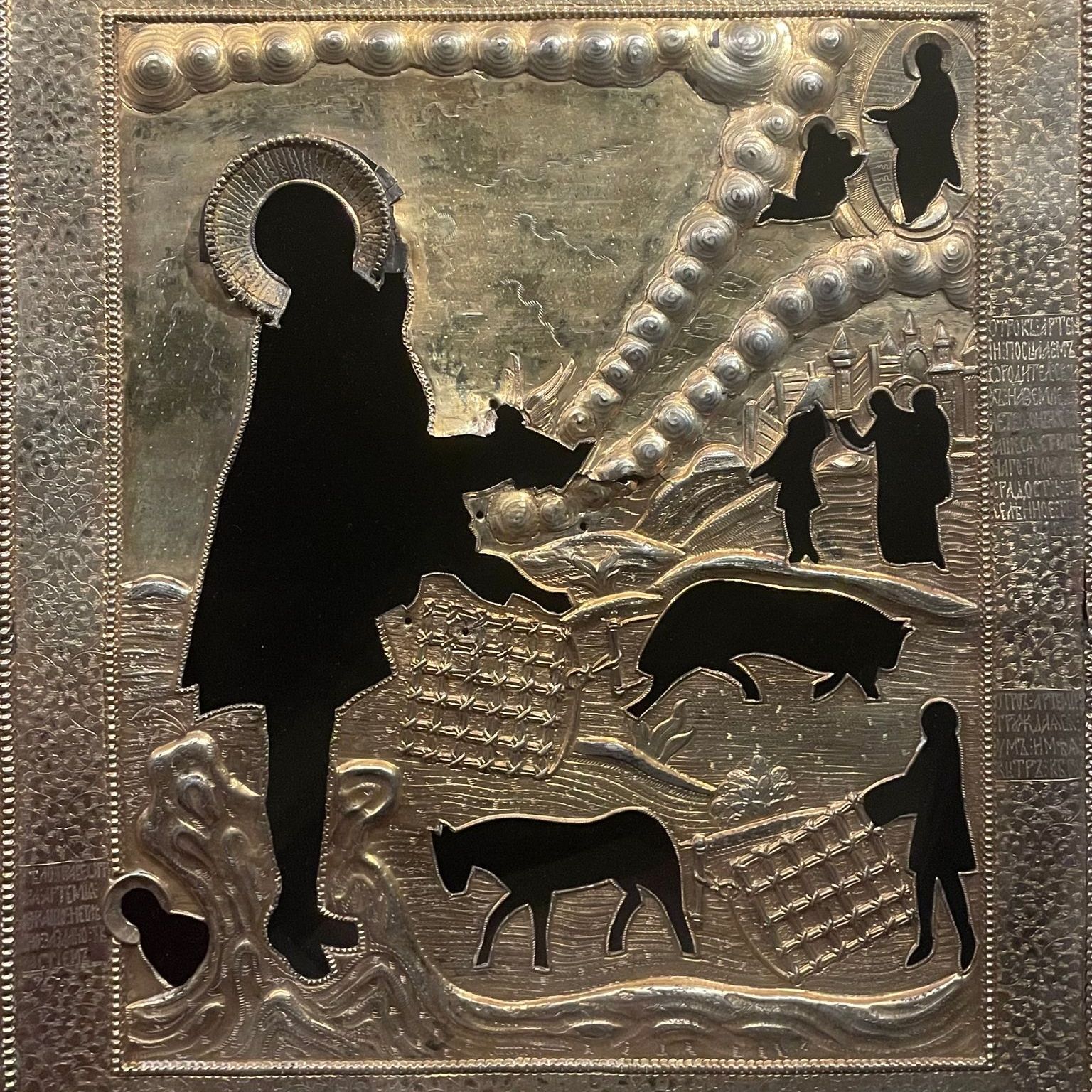 Riza, sculpted bronze relief