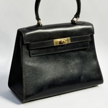 HERMÈS PARIS, Mini Kelly saddle bag in black box calfskin