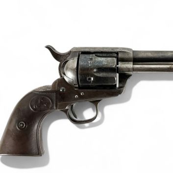 Colt SA model 1873. Six-shot, door-loading caliber 38 WFC.