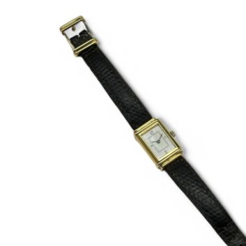 YVES SAINT-LAURENT Montre-bracelet à boitier basculant en or 18K (750 millièmes)