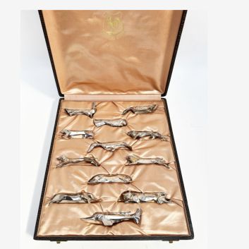 GALLIA, after a model by SANDOZ Suite of twelve silver-plated knife-holders