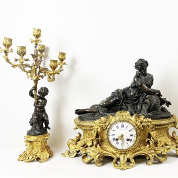 CHARPENTIER Cie Richly chased gilt bronze mantelpiece with black patina.
