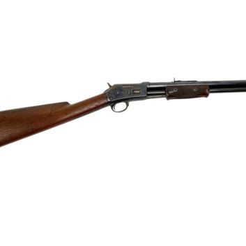 Colt 1887 rifle. Pump system and tubular magazine under the barrel.