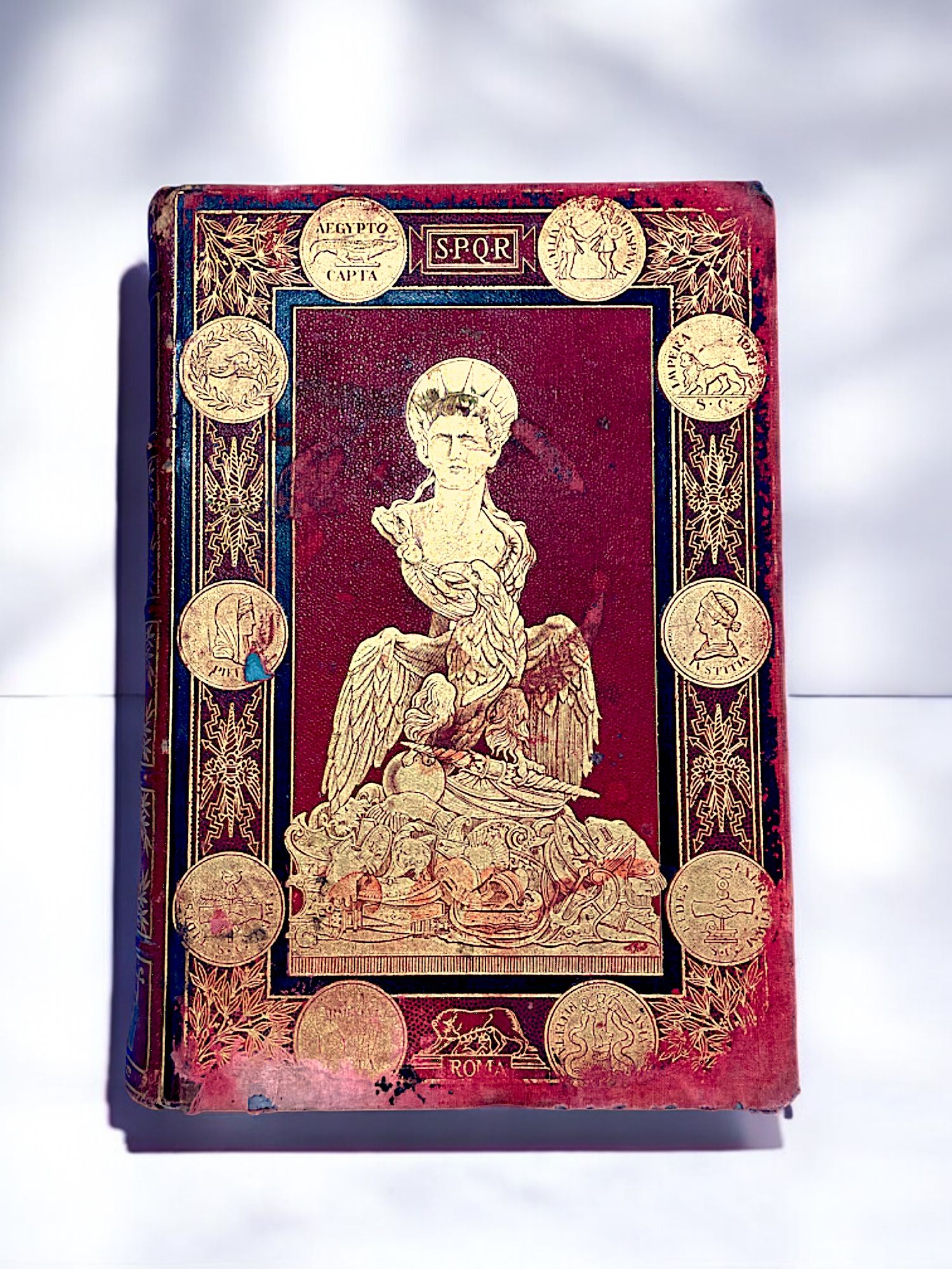 Cover of an antique book about Rome