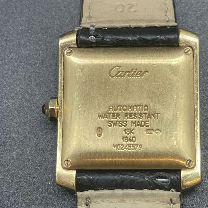 Cartier's signature on a Tank model