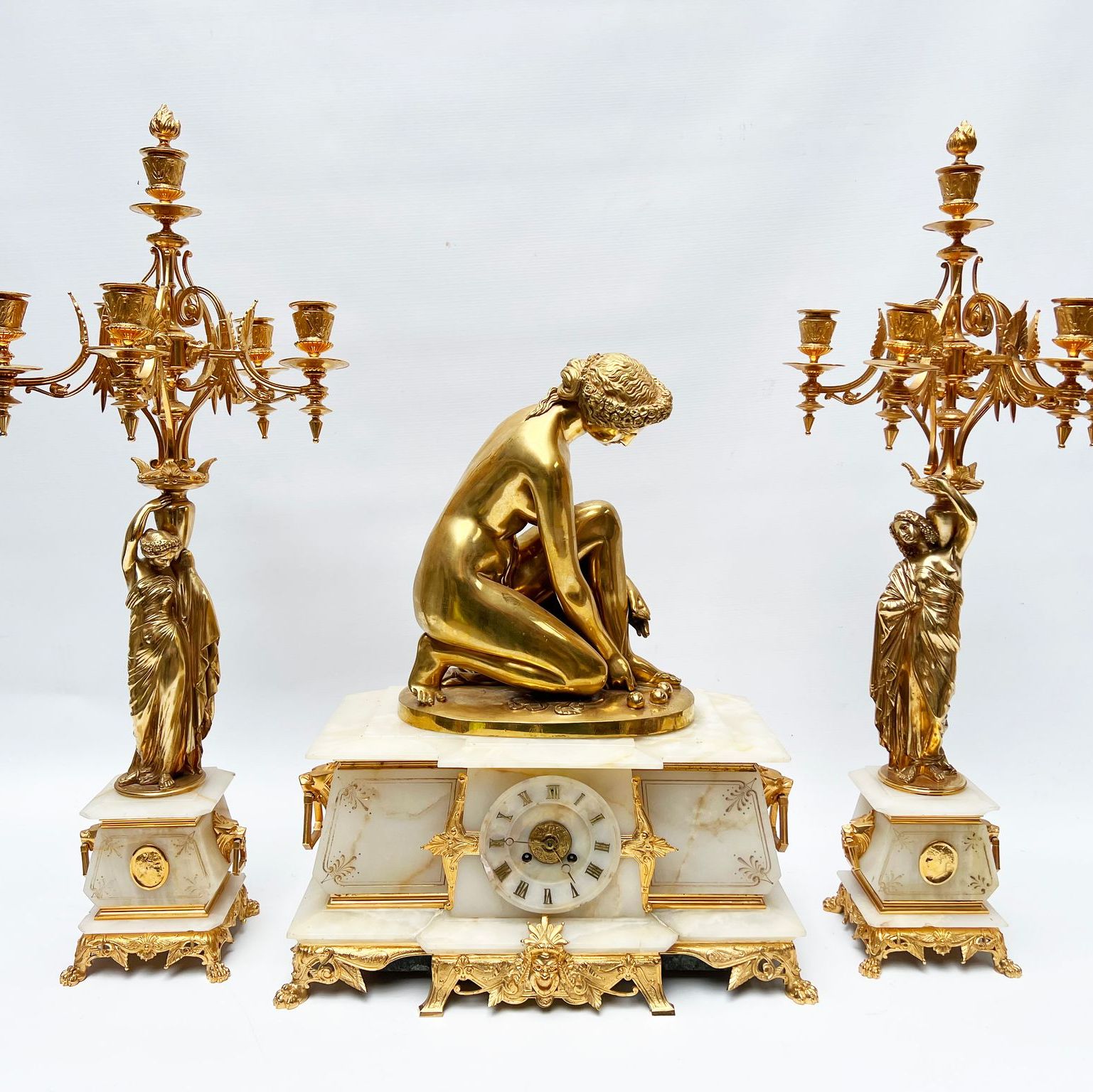 Gilt bronze Venus clock and candelabra