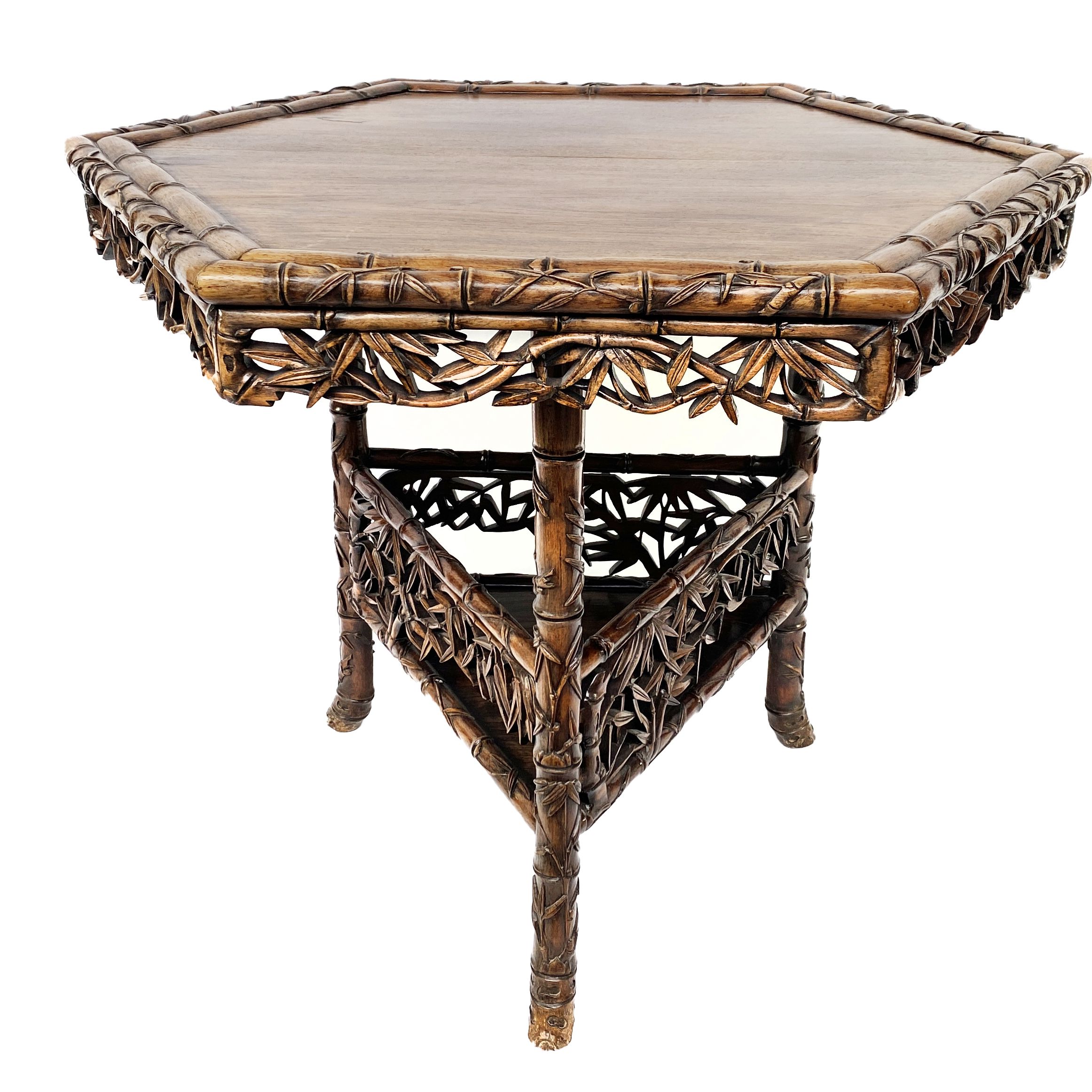 China (early 20th century), richly carved and openwork wooden pedestal table with Bamboo decoration