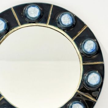 MITHÉ ESPELT (1923-2020) Round wall-mounted mirror, circa 1990, model in stamped earthenware and blue enamel